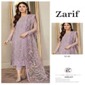 Woman wearing a lavender embroidered outfit with a matching dupatta, branded 'Zarif'.
