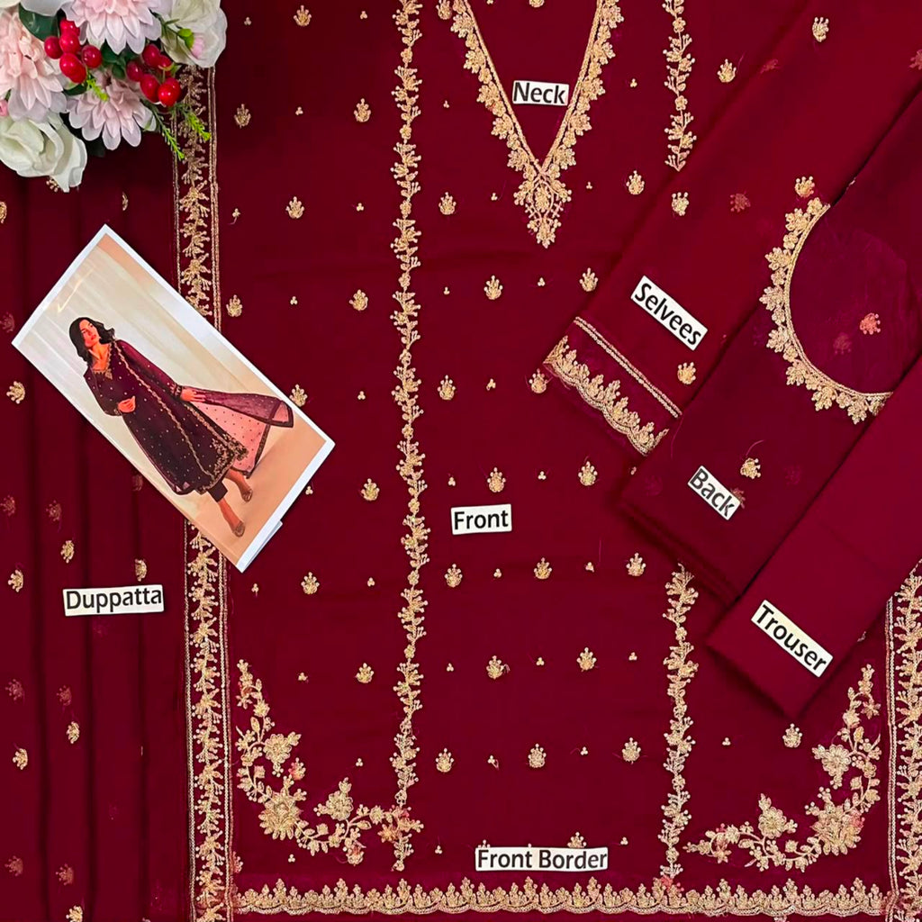 A flat-lay presentation of a deep maroon/burgundy salwar suit set with intricate gold embroidery. The set includes a kurta labeled 'Front', matching pants labeled 'Trouser', dupatta labeled 'Duppatta', and inner blouses labeled 'Select'.